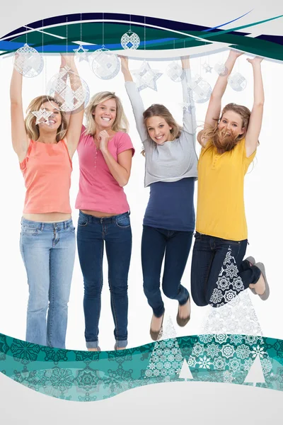 Smiling celebrating girls jumping up — Stock Photo, Image