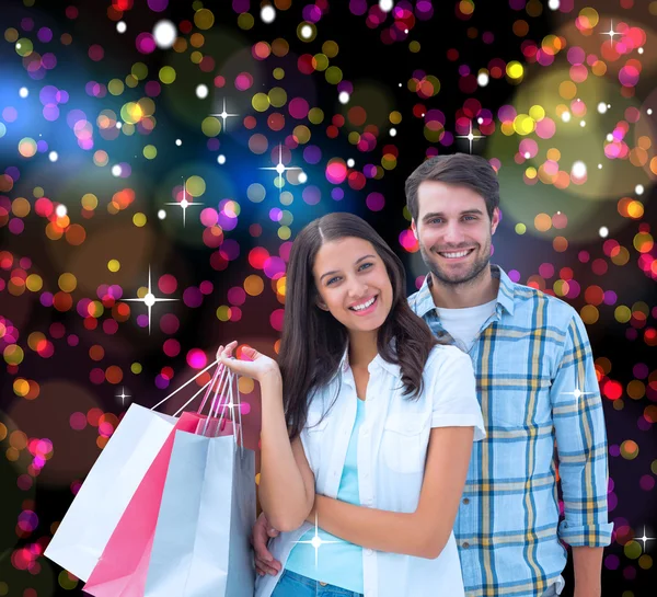 Couple with shopping bags — Stock Photo, Image