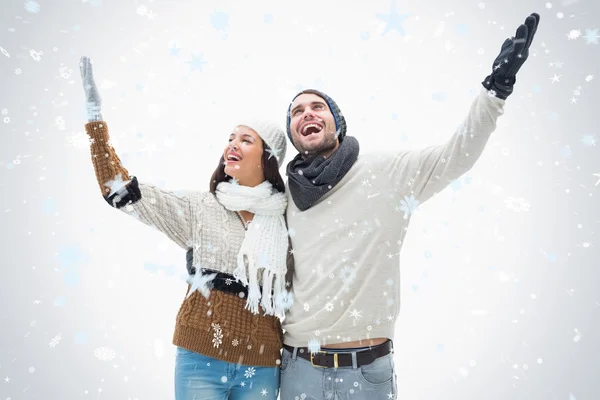 Attractive young couple in warm clothes — Stock Photo, Image