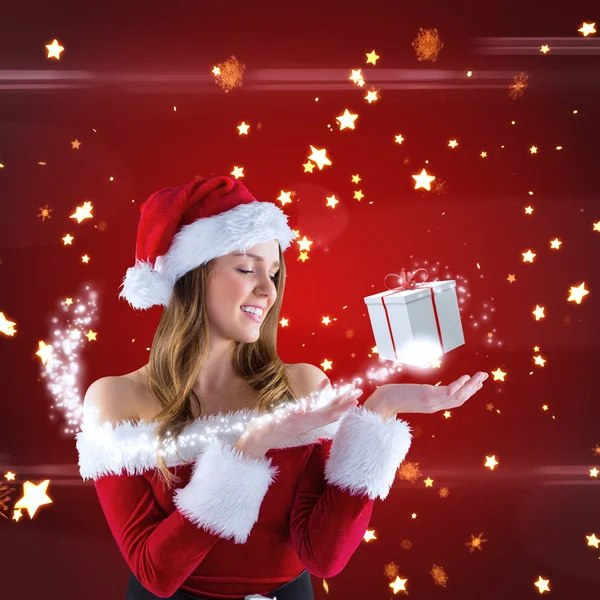 Sexy Weihnachtsmann Mädchen präsentiert mit Hand — Stockfoto