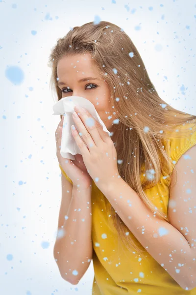 Blond woman blowing — Stock Photo, Image