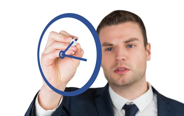 Businessman drawing clock — Stock Photo, Image