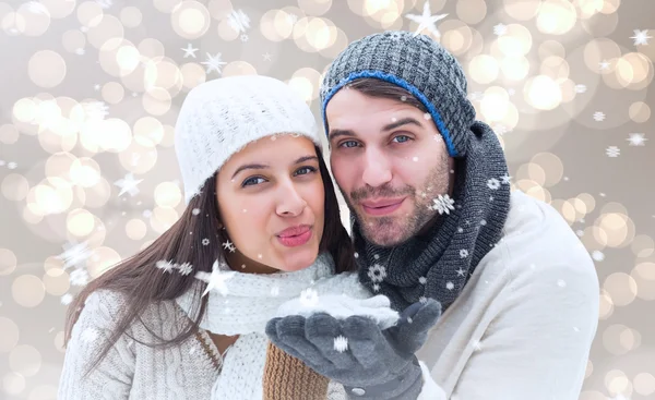 Young winter couple against — Stock Photo, Image