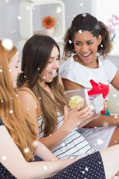 Cheerful young women surprising friend — Stock Photo, Image