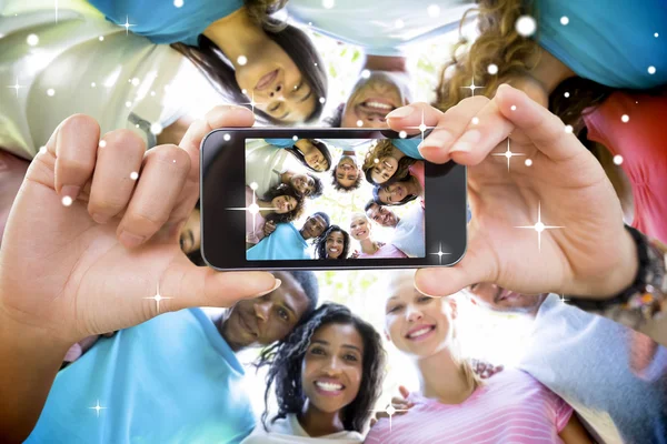 Friends forming huddle — Stock Photo, Image