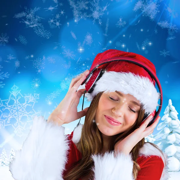 Sexy santa menina ouvindo música Imagens Royalty-Free