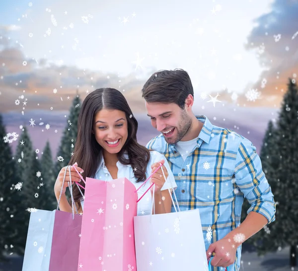 Couple with shopping bags — Stock Photo, Image