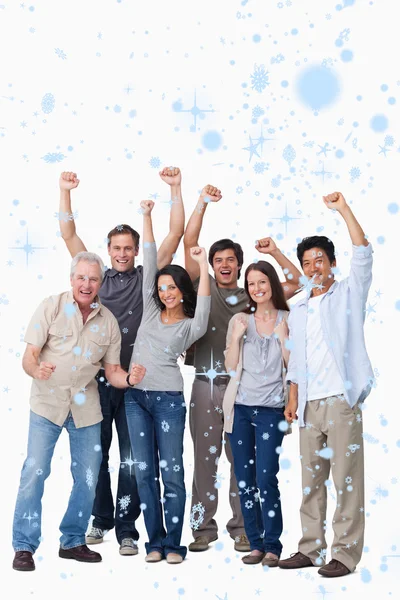 Composite image of cheering group of people — Stock Photo, Image