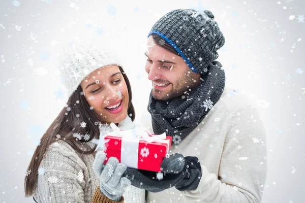 Attractive young couple in warm clothes — Stock Photo, Image