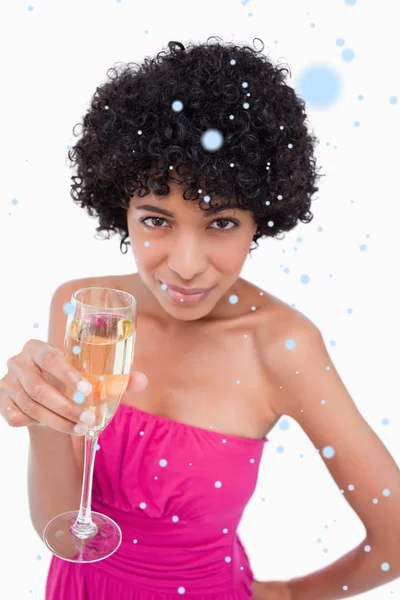 Jonge vrouw met een glas champagne — Stockfoto