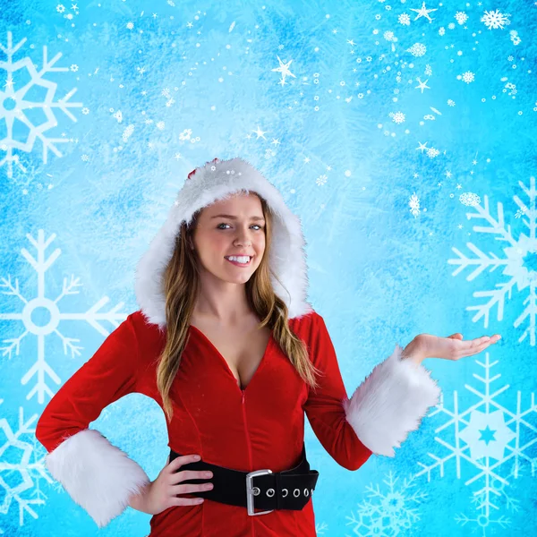 Sexy Weihnachtsmann Mädchen präsentiert mit Hand — Stockfoto