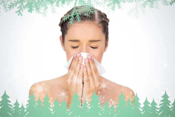 Sick model blowing her nose — Stock Photo, Image