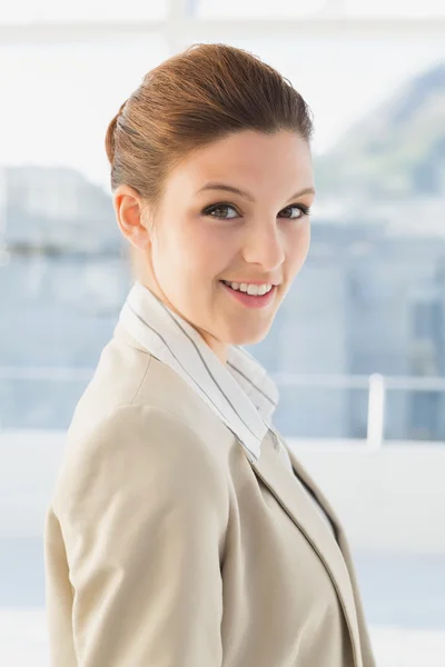 Pretty businesswoman looking at camera — Stock Photo, Image