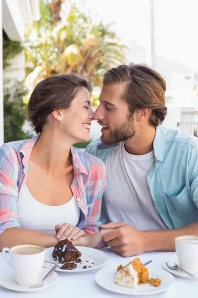 Happy couple enjoying coffee together — Stock Photo, Image