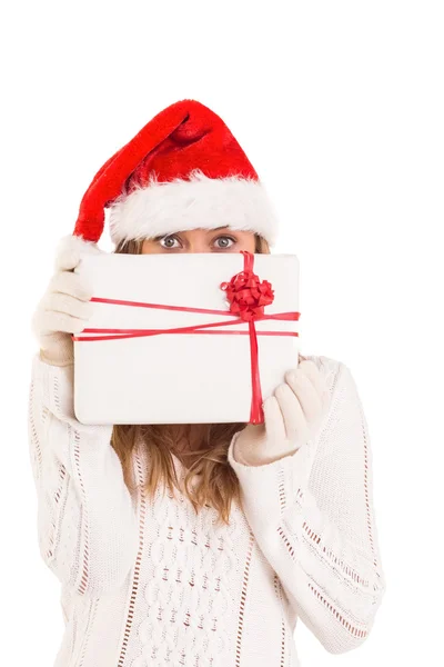 Festive blonde holding a gift — Stock Photo, Image