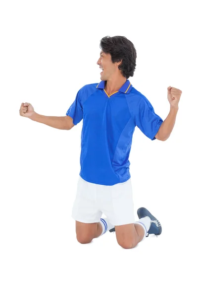 Athletic football player cheering — Stock Photo, Image