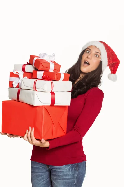 Mujer sosteniendo muchos regalos de Navidad — Foto de Stock