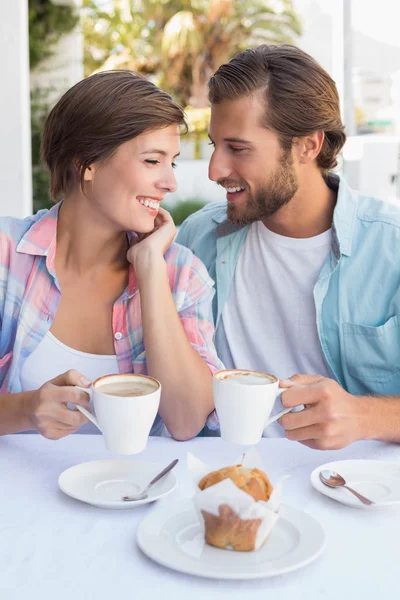 Happy couple enjoying coffee together — Stock Photo, Image