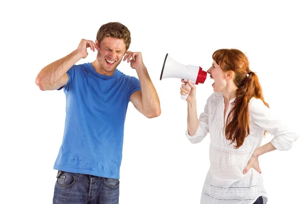 Woman shouting through a megaphone — Stock Photo, Image