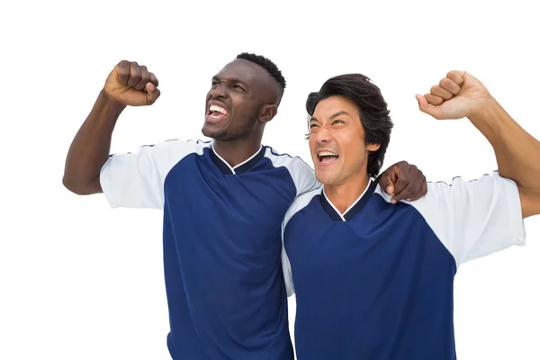 Fotbollsspelare som firar en vinst — Stockfoto