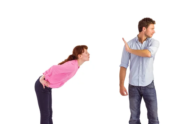 Man stopping woman from kissing — Stock Photo, Image