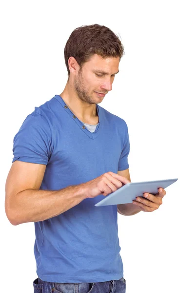 Man scrolling through tablet pc — Stock Photo, Image