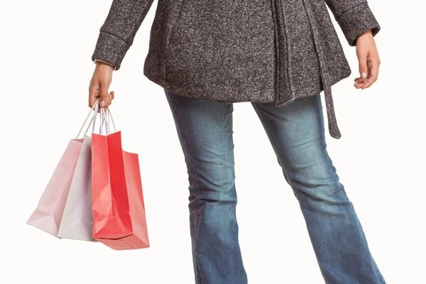 Sorrindo mulher segurando saco de compras — Fotografia de Stock