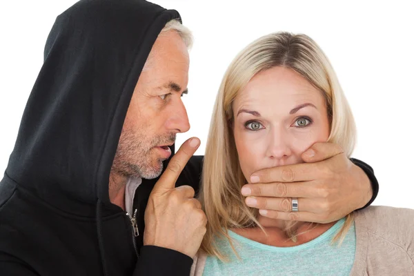 Close up of theft covering woman's mouth — Stock Photo, Image