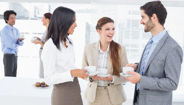 Business people enjoying their drinks — Stock Photo, Image