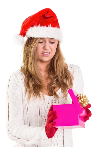 Festive blonde opening a gift — Stock Photo, Image