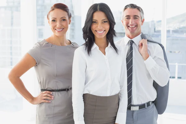 Businesswoman smiling while at work — Stock Photo, Image