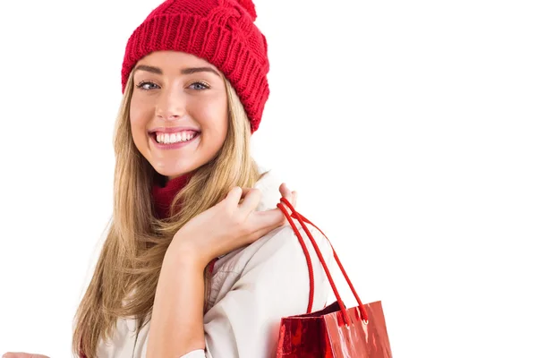 Bonita rubia sosteniendo bolsas de compras —  Fotos de Stock