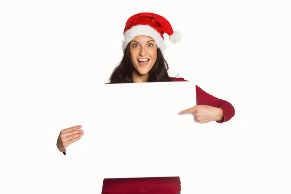 Woman pointing at white sign — Stock Photo, Image