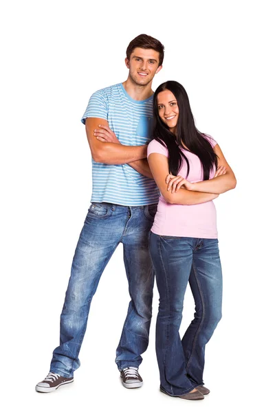 Joven pareja sonriendo a la cámara — Foto de Stock