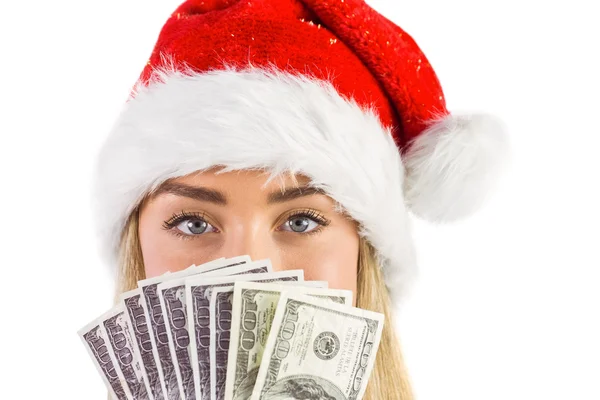 Праздничная блондинка держит фаната долларов — стоковое фото