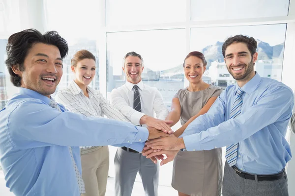 Employee's putting hands together — Stock Photo, Image