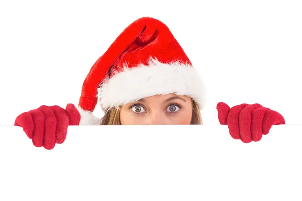 Festive blonde holding a poster — Stock Photo, Image