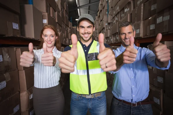 Warehouse team showing thumbs up — Stock Photo, Image