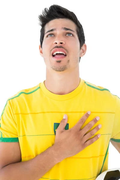 Brazilian football player singing to anthem — Stock Photo, Image