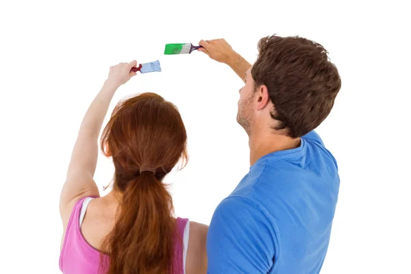 Couple both about to paint — Stock Photo, Image