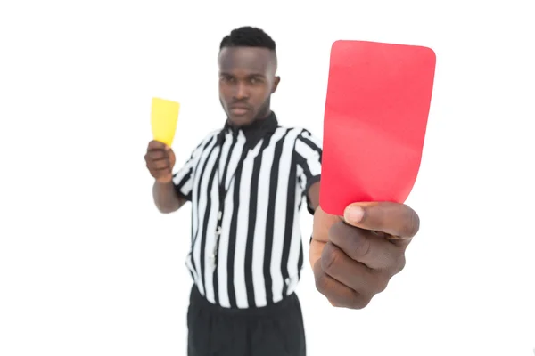 Serious referee showing yellow and red card — Stock Photo, Image