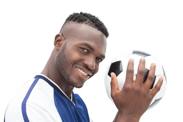 Närbild porträtt av en leende stilig fotbollsspelare — Stockfoto