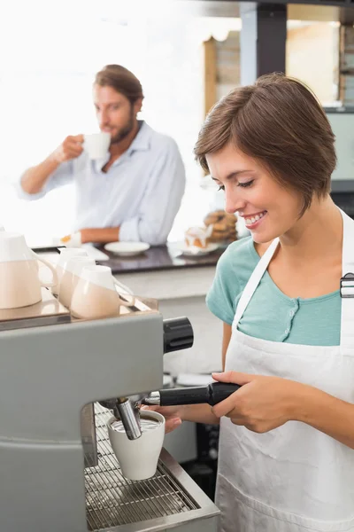 Pretty barista making cup of coffee — Stock Photo, Image