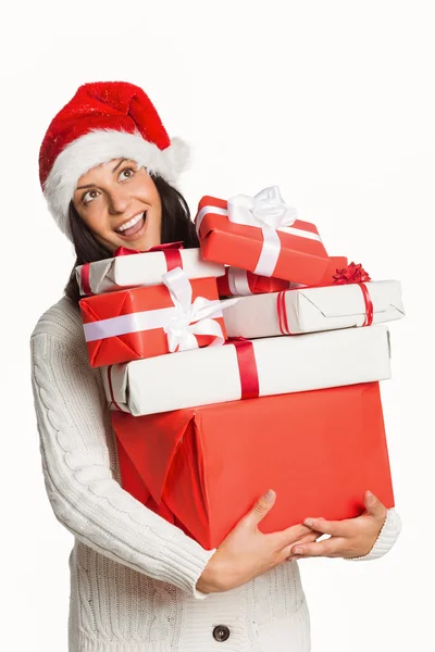 Smiling woman with christmas presents — Stock Photo, Image