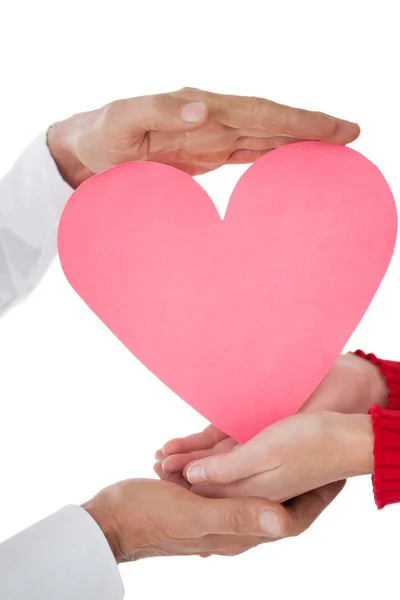 Close up of hands holding heart — Stock Photo, Image