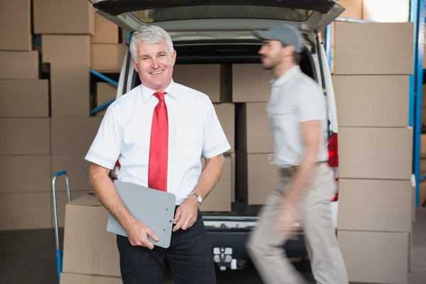 Warehouse manager smiling — Stock Photo, Image