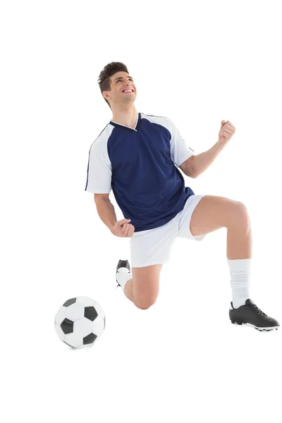 Jogador de futebol atlético torcendo — Fotografia de Stock