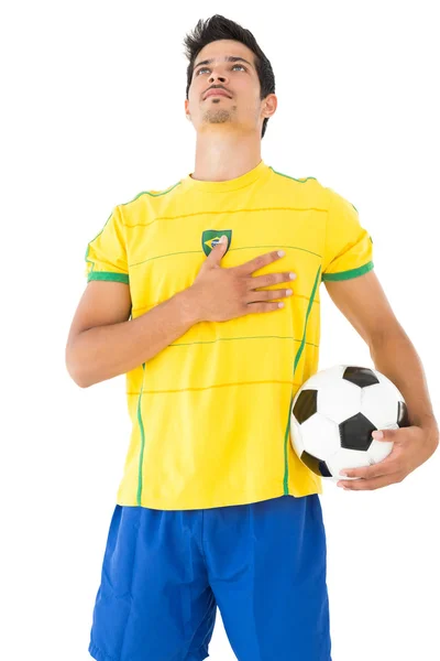 Brasilianischer Fußballer hört Hymne — Stockfoto