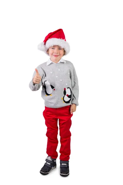 Niño usando un sombrero de santa — Foto de Stock