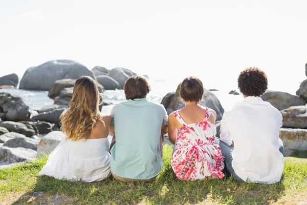 Gorgeous friends looking out to sea — Stock Photo, Image